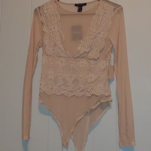 Long sleeved laced body suit